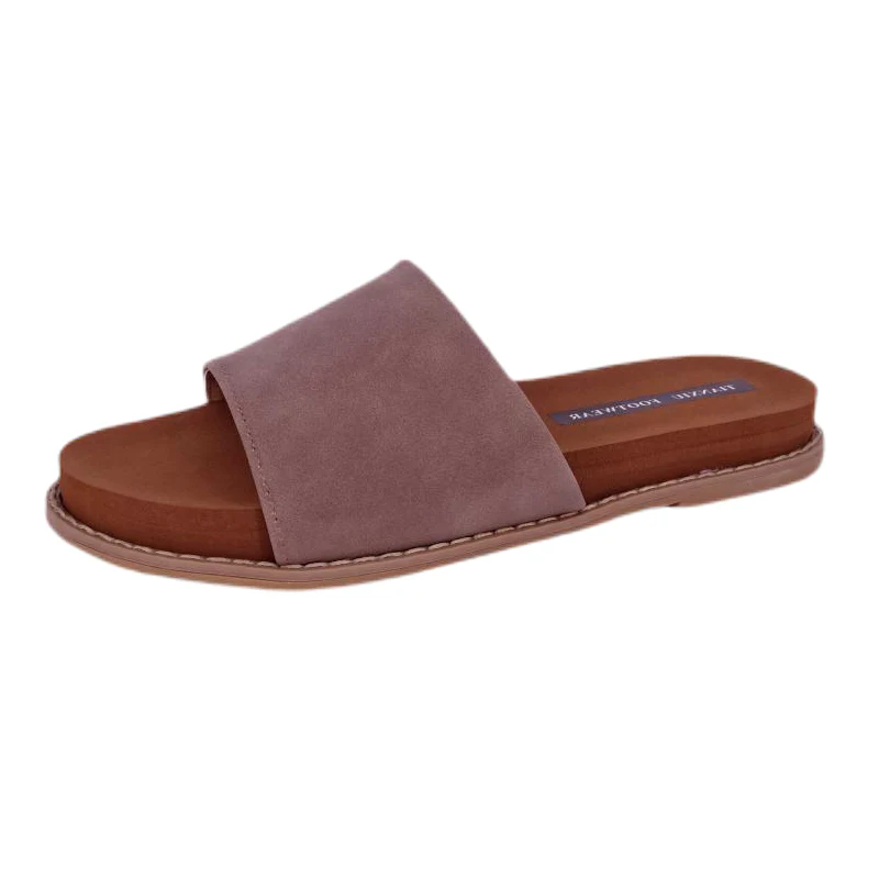 Cosa rende i sandali piatti moderni la scelta di calzature più pratica oggi?